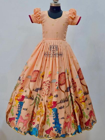 A full view of the playful Kalamkari print long frock.