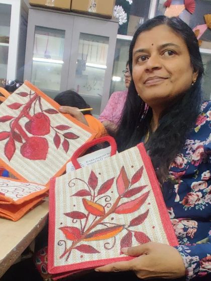 Holding up the finished products from our workshop. The sense of accomplishment is the best part.