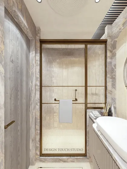 This render highlights the stylish fluted glass shower door and the elegant, minimalist fixtures.