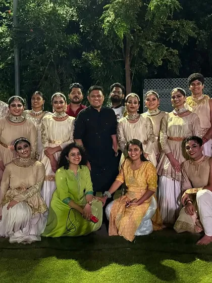 Our team posing in costume with our lead choreographer. It takes a village to put on a show, and we're so proud of our talented dancers and crew.