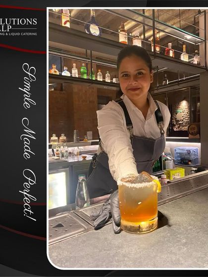 Presenting a finished cocktail at the Chloé event, a perfect blend of flavor and fragrance.