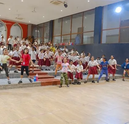 School sessions are always full of energy! Here I am leading a large group of students through a routine for their annual day function. I can manage and choreograph for big groups, making sure everyone is included and has a great time.