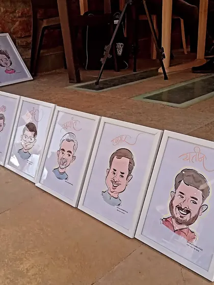 Getting ready for a big event with a lineup of framed caricatures. Whether for a corporate event, wedding, or party, I can create on-the-spot art that serves as both entertainment and a personalized return gift for your guests.