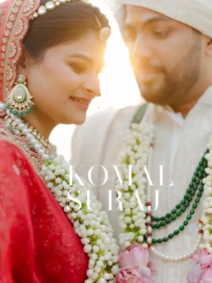 A soft, romantic close-up of the couple, their faces glowing in the golden hour light. A perfect, intimate wedding portrait.