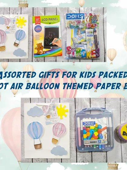 This hot air balloon-themed gift set includes a color set, a Spot It game, and an LCD tablet, all packed in a whimsical themed paper bag.
