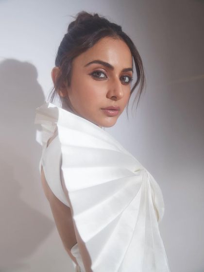 A full look at the Tanieya Khanuja gown for Rakul Preet Singh. The combination of the pleated, sculptural top and a sequined pencil skirt made for a standout ensemble at the Pinkvilla Style Awards.