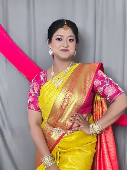 Confidence and grace. The makeup here is designed to make the client feel like the best version of herself for her special event.
