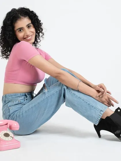 A fun, retro inspired shoot with a pink monochrome theme. I kept the makeup on the model simple to let her amazing natural curls and the fun props stand out.