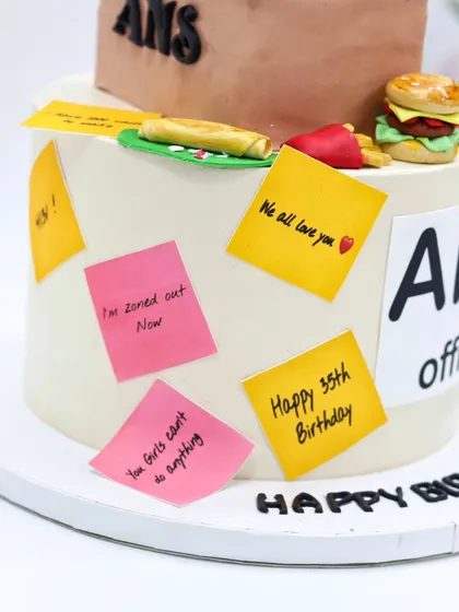 Detail of the edible sticky notes with inside jokes and birthday wishes.
