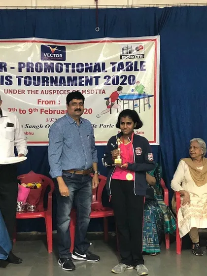 Manasi Jare receiving her trophy for winning the U-17 girls' event at the Vector Promotional Tournament. Her hard work in training paid off beautifully.