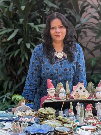 My stall at the Delhi Potter's Market, filled with Christmas decor, tableware, and whimsical figurines. It was my first time in Delhi, and the appreciation for art was wonderful.