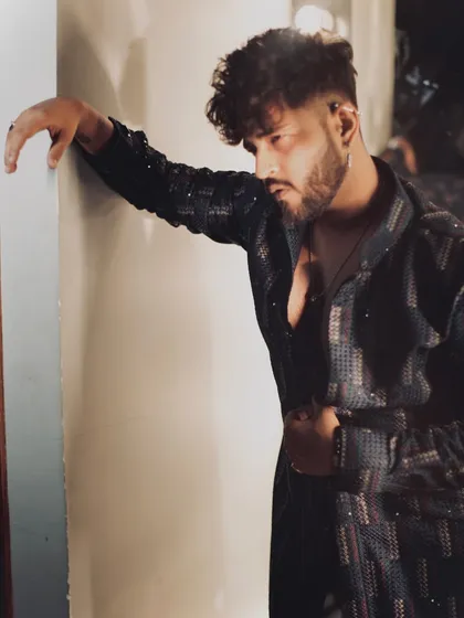 For a Diwali look, I styled Viraj Joshi in this dark, sequined jacket. It's a modern and glamorous take on festive wear for men, perfect for an evening celebration.