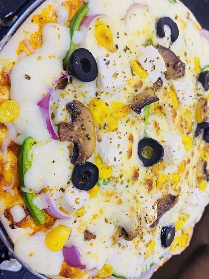 Another look at my cheesy and delicious homemade pizza. I can customize the toppings based on your preference.
