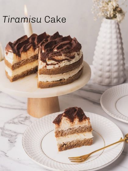 Our classic Tiramisu Cake is a perfect, elegant dessert for any celebration, including Father's Day. It features layers of coffee-soaked sponge and light mascarpone cream.
