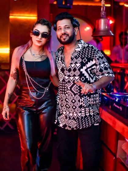 Posing with my friend, the talented DJ Jenny. It's always great to connect with fellow artists.