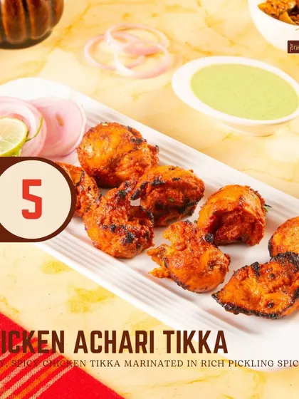 Our Chicken Achari Tikka is for those who love a tangy kick. The chicken is marinated in pickling spices, giving it a unique and zesty flavour.
