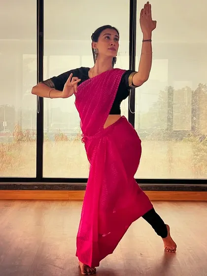 A full-body pose in a pink saree, interpreting a poem by Sarojini Naidu through movement. This is an example of how I translate literary concepts into physical form for artistic photoshoots.