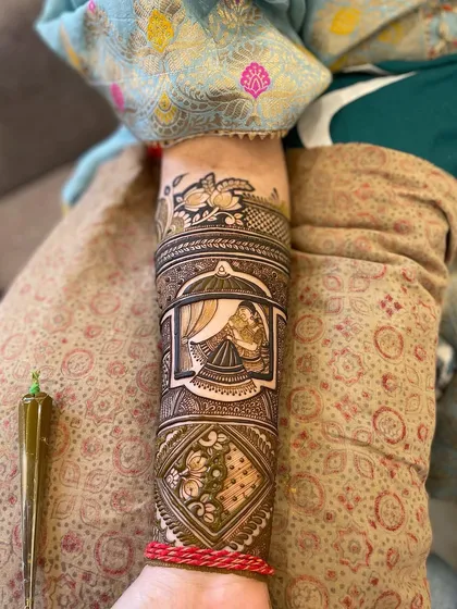 Another look at the intricate bridal arm design, showing the mehndi cone next to the finished work. I use only 100% natural henna for a safe application and guaranteed dark color.