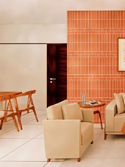 The open layout connects the living and dining areas seamlessly. The use of consistent flooring and a light color scheme helps to unify the space and make it feel larger.