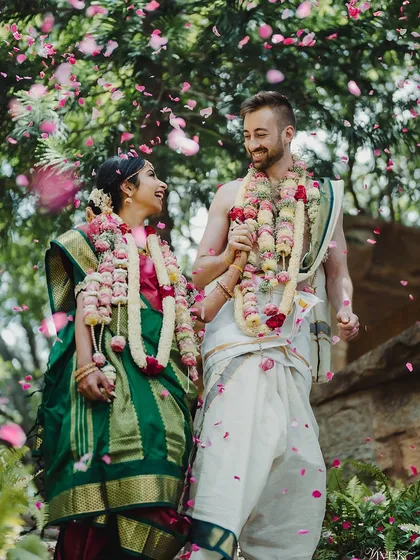 The pure joy of a cross-cultural union, as Namratha and Luke are showered with petals. Our venue thrives on moments like these, where love beautifully bridges two worlds.