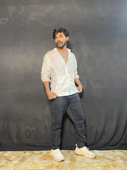 A more candid, relaxed shot from the same photoshoot.