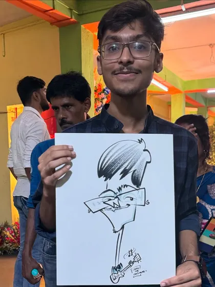 A budding guitarist in the house! This young man's passion for music was the perfect theme for his personalized caricature.