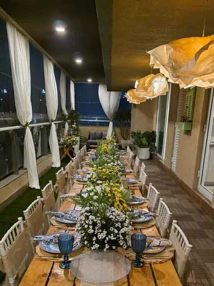 My live pizza catering fits perfectly into any celebration, like this beautifully decorated birthday dinner on a balcony. The setup is compact and designed to complement your event's ambiance.