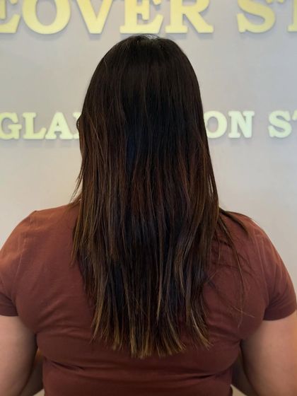 The "before" shot. This shows the canvas we started with before creating the stunning, bold red hair transformation.