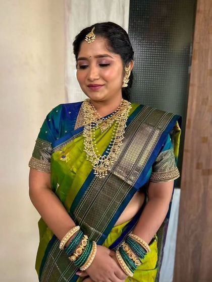 A close-up on the subtle glam created for this Maharashtrian engagement. The focus is on flawless skin and soft, defined eyes.