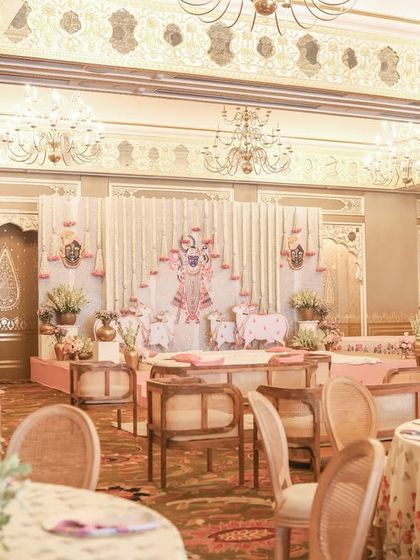 An overview of the indoor Pichwai setup, showing how the theme was adapted for a ballroom setting with the same grace and attention to detail.