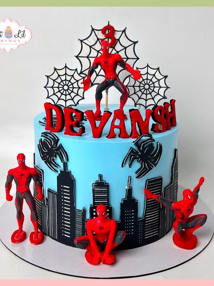 Your friendly neighborhood Spider-Man swings into action on this superhero cake. Featuring a city skyline, spider webs, and multiple Spidey figures, it's an action-packed centerpiece for a 3rd birthday.