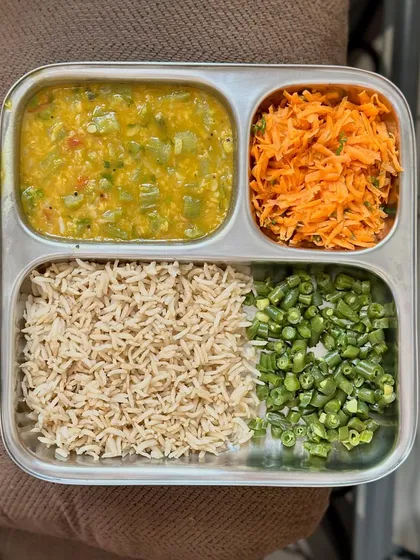 A repeat of my simple vegetarian meal of brown rice, bottle gourd dal, and a side of sautéed carrots and beans.