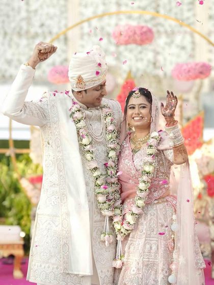 A gorgeous pastel bride. Her soft, rosy glow and the sparkle in her eyes were crafted to let her natural beauty shine through. This is the essence of grace and bridal radiance.