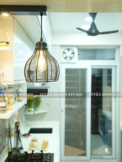We pay attention to every detail, including lighting. These industrial-style pendant lights add character and provide focused light over the breakfast bar area.