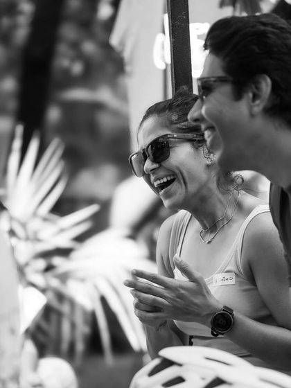 Pure joy and laughter captured in this black and white photo from the Garage Sale. These are the moments we cherish.