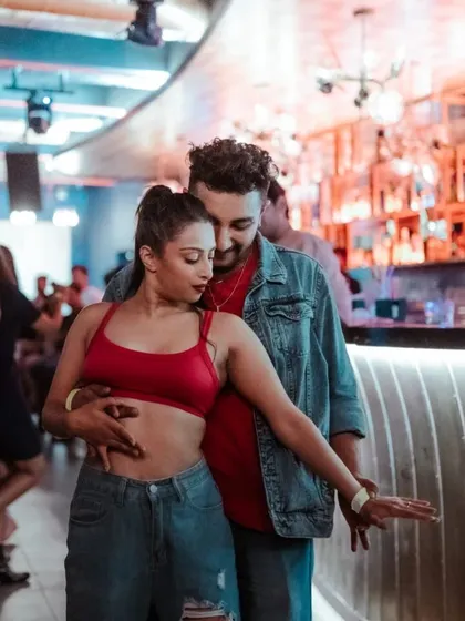 On the dance floor is where we feel most alive. This is us catching a vibe during a social dance night. We bring this same passion whether we are performing, teaching, or just dancing with you.