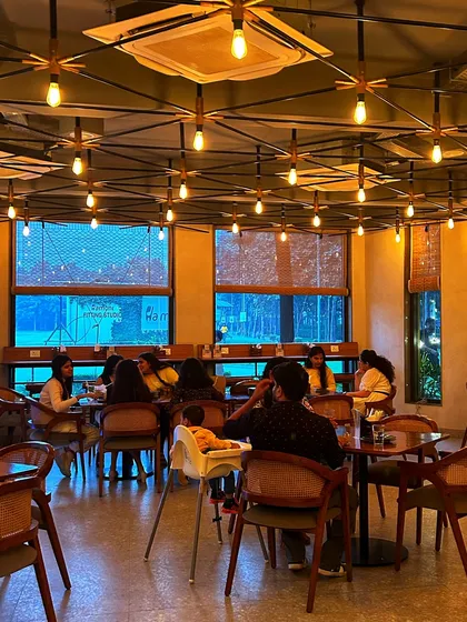 The indoor seating area of our cafe, with its unique lighting and cozy atmosphere.