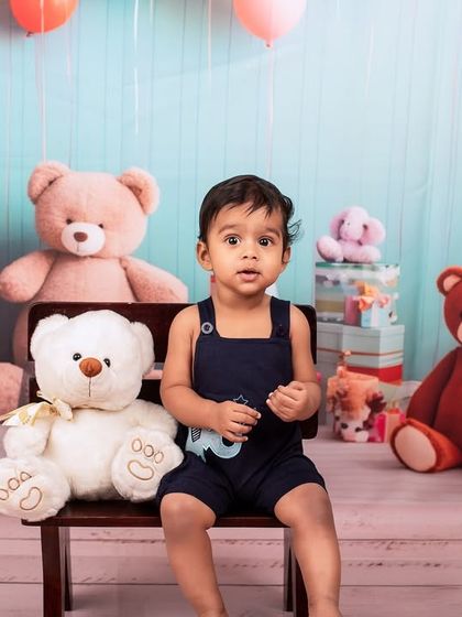 A classic first birthday setup with teddy bears and balloons. My studio is equipped to create these adorable and memorable scenes for your little one.