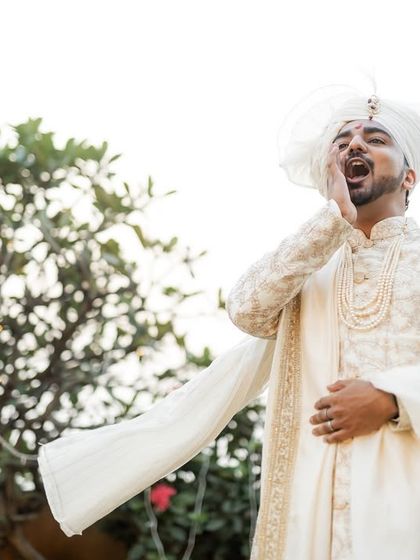 The groom's excited and playful shout as he waits for his bride. We capture the groom's personality and anticipation just as much as the bride's.