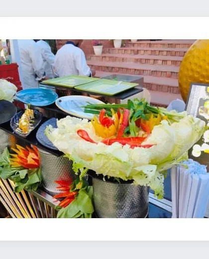 A beautifully decorated sushi station at an outdoor event, showcasing our commitment to presentation and quality.
