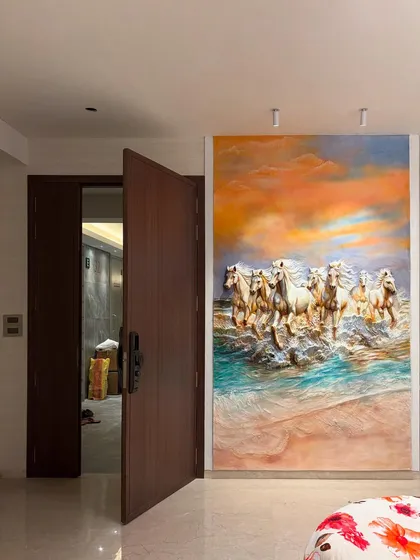 Here you can see how my 7 Horses mural transforms this bedroom wall. The vibrant sunset colors and dynamic 3D texture create a powerful and auspicious Vastu painting.