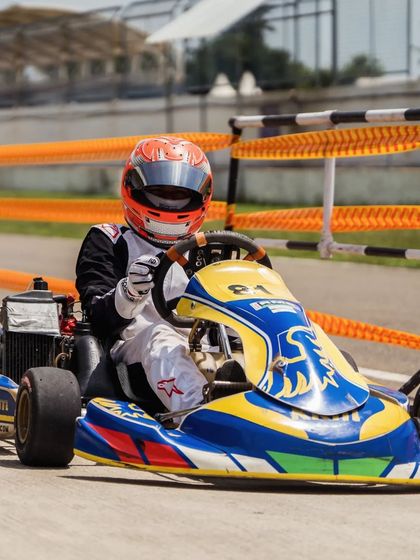 A front-on shot of our driver in the number 81 kart.