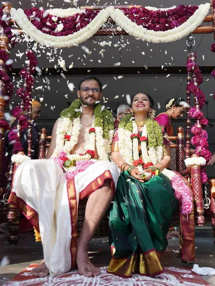 The oonjal (swing) ceremony is filled with so much joy. I love seeing my brides, like this happy Iyer bride, enjoying these beautiful traditions without worrying about their makeup.