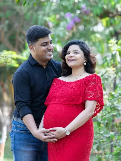 It's the shared smiles and happy glances that I love to capture. This candid moment between an expecting couple in a sunlit park shows the pure joy and excitement of their journey together.