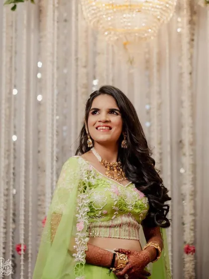 An engagement bride looking radiant in lime green. We gave her a soft, pretty makeup look with a pop of pink on the eyes to complement her vibrant outfit. ✨🤍