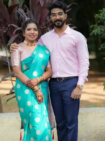 A lovely portrait of the engaged couple, looking happy and in love.