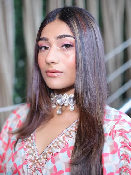 Embracing beauty with a soft pink makeup look. This is a lovely choice for a bridesmaid, as it's fresh, youthful, and photographs beautifully.