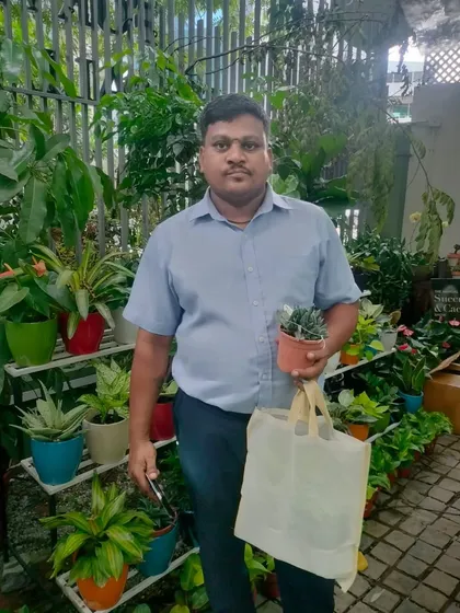A proud new plant owner at our World Environment Day event. We hope this little succulent brings him lots of joy.
