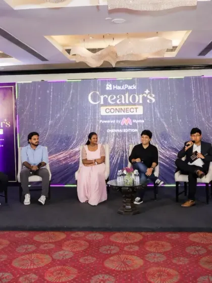 We ensure clear and professional coverage of all key segments, including panel discussions. This well-composed shot from the Creator's Connect event captures all seven panelists in a single, balanced frame, ideal for post-event reports and articles.