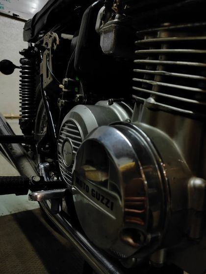 Another angle of the Moto Guzzi's engine, showcasing its distinctive design.